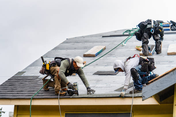 Professional Gutter Installation technician working in Newport, RI